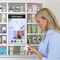 Os armários de exposição interativos de compra da mostra estabelecem uma comunicação